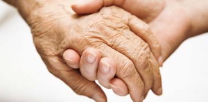 Parkinsons disease and massage, picture of hands touching