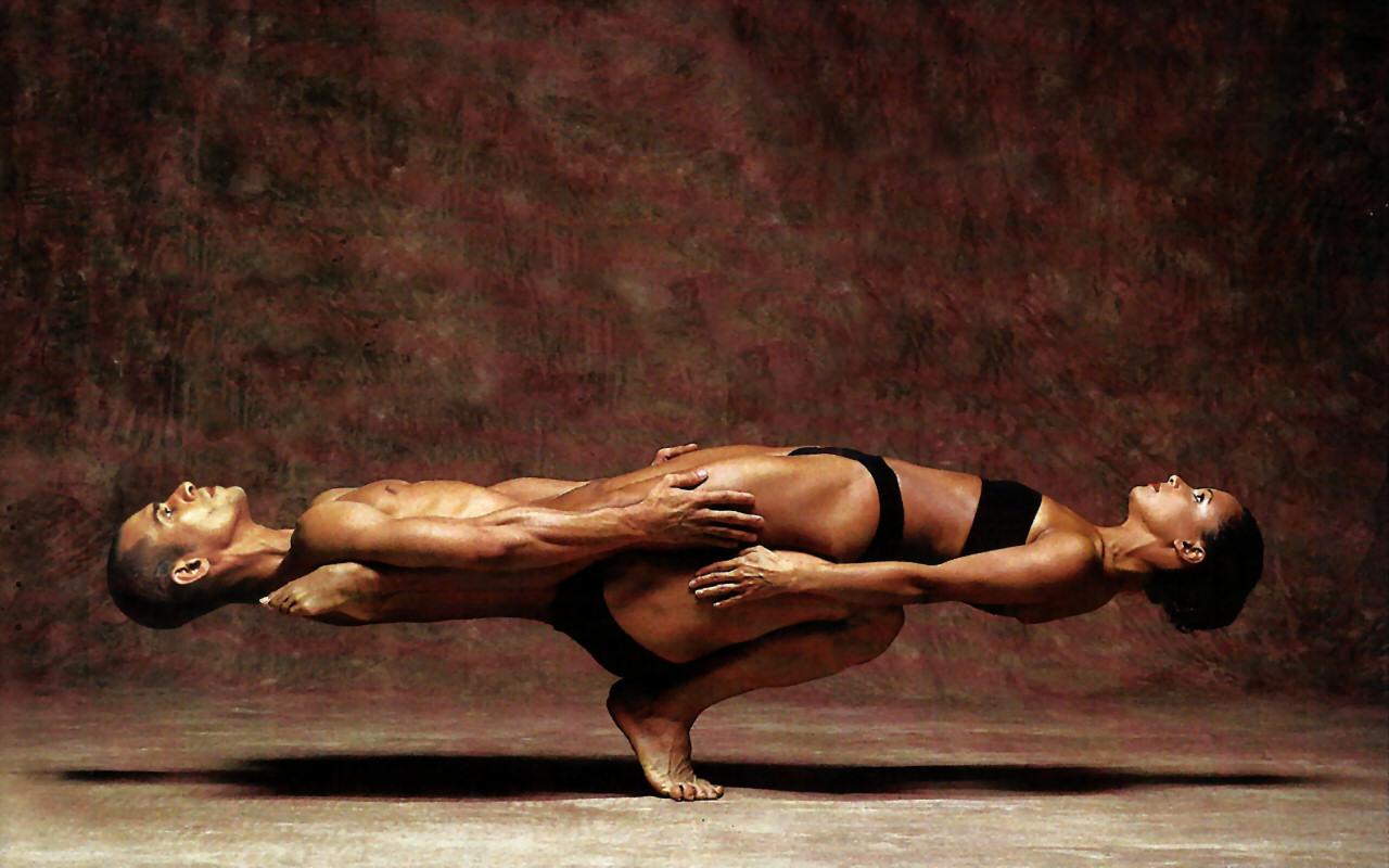 Balanced bodies in acro yoga move